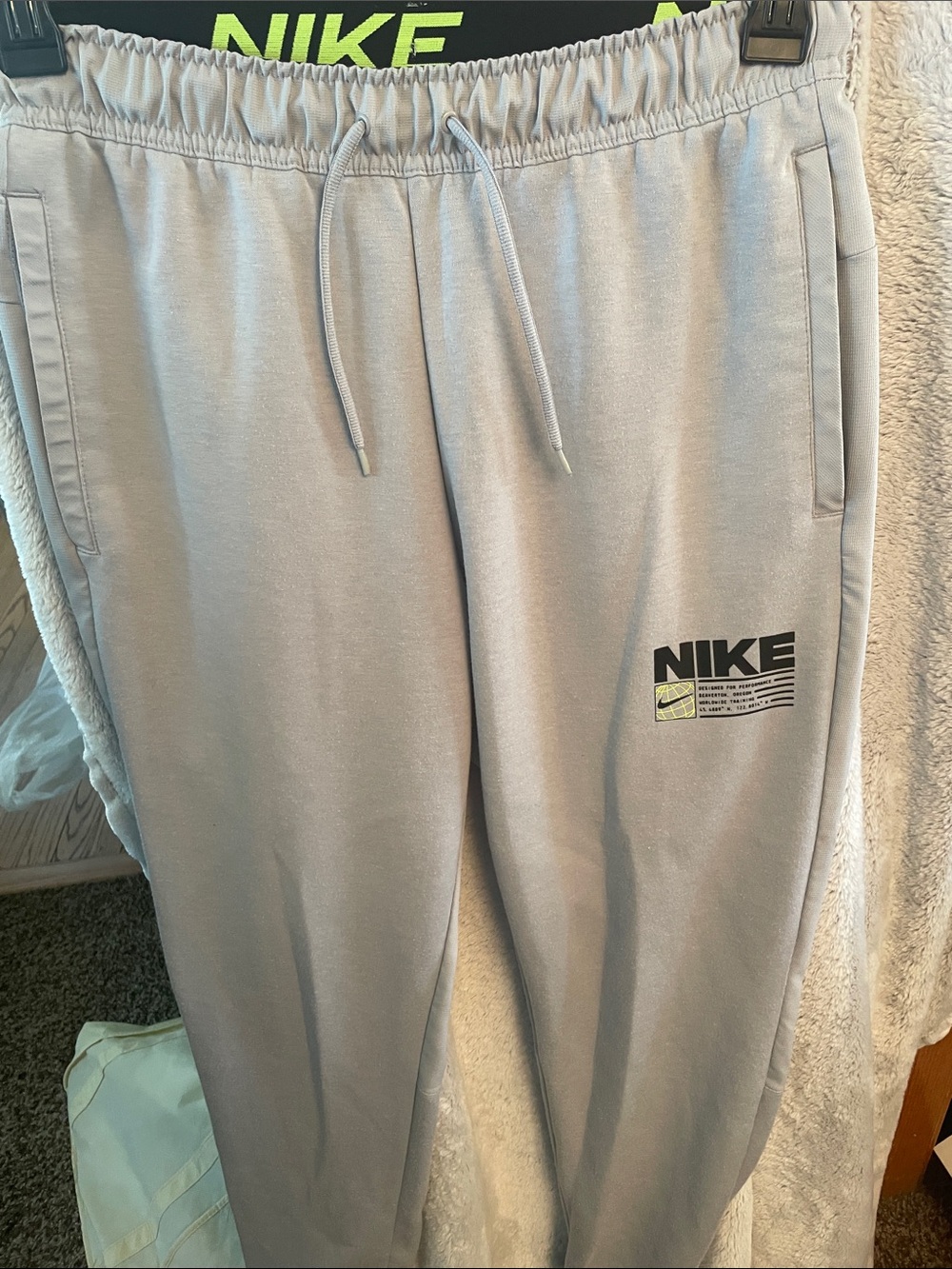 Nike Light Gray Sweatpants with Black Logo and Neon Accent